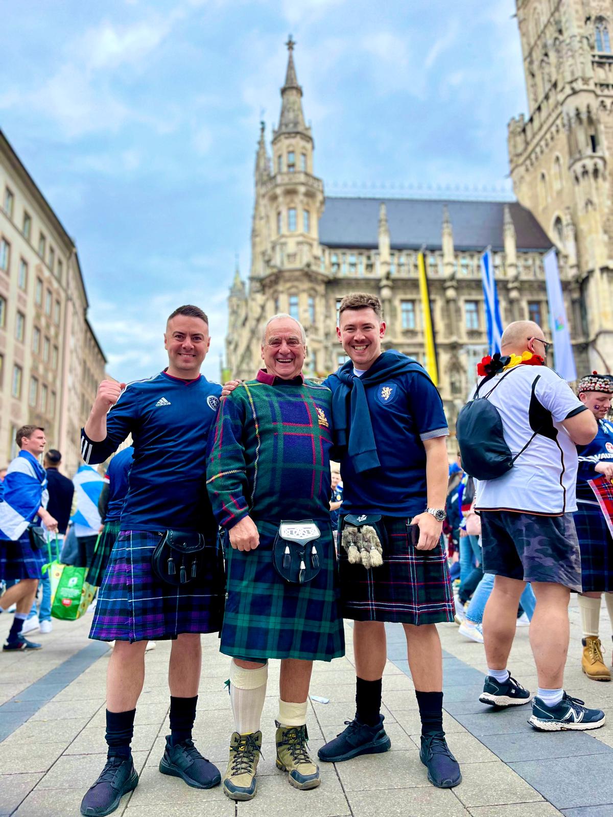 The Dohertys in kilts with the Tartan Army